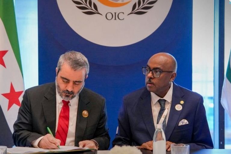 Al-Shaibani Signs Legal Agreements with OIC in Baghdad